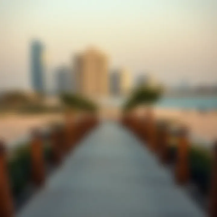 Pathway leading to Al Hudayriyat Beach with urban backdrop